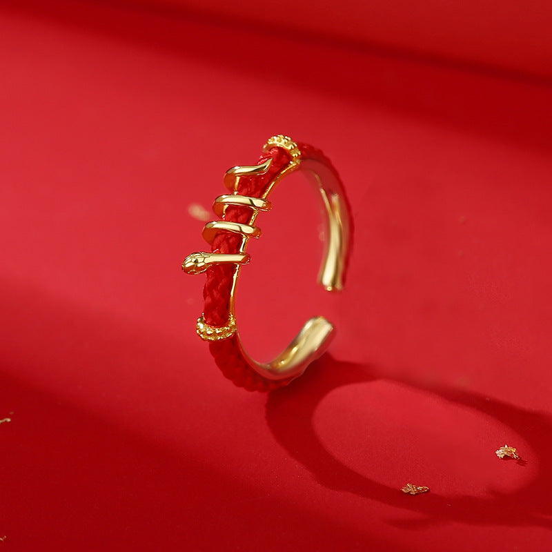 Detailed close-up of the Serpent Ring showing the cubic zirconia embellishments and coiled snake design.